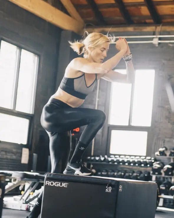 Woman doing lunges warm up